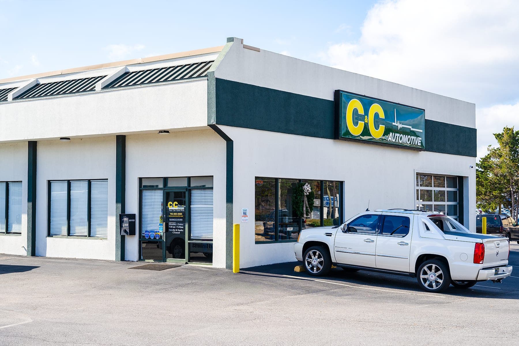 C&C Automotive Martinez shop exterior on Washington Road with the Your Car Care Pros sign above the entrance.