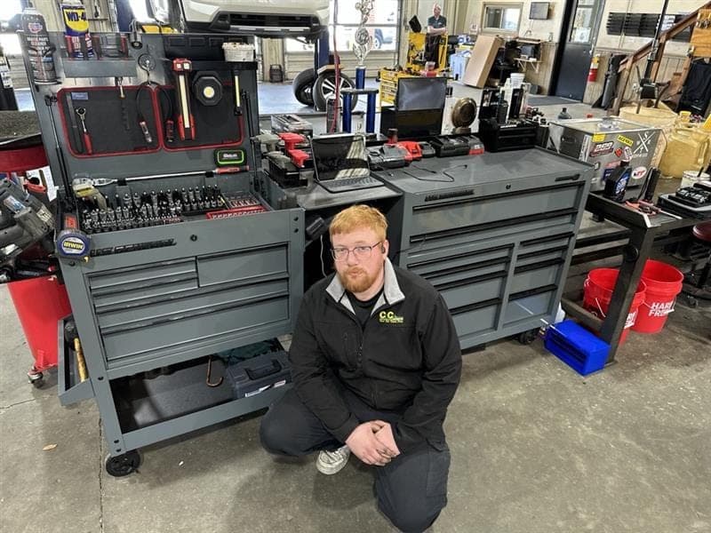 C&C Automotive technician with his tool box in the Thomson shop